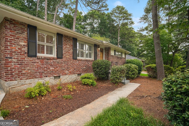 2790 Laurel Ridge Dr, Decatur, GA 30033 - view of home's exterior featuring brick siding and crawl space