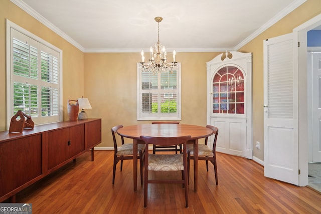 2790 Laurel Ridge Dr, Decatur, GA 30033 - dining room featuring a chandelier, hardwood / wood-style floors, and crown molding