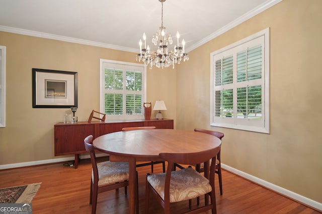 2790 Laurel Ridge Dr, Decatur, GA 30033 - dining room featuring wood finished floors, a chandelier, and crown molding