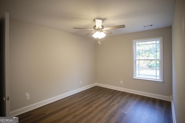 331 Red Berry Rd, Jackson, GA 30233 - spare room with dark wood-type flooring and a ceiling fan