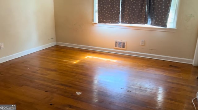 6521 Menlo Way, Rex, GA 30273 - unfurnished room with hardwood / wood-style floors and healthy amount of natural light
