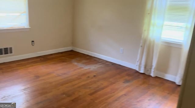 6521 Menlo Way, Rex, GA 30273 - unfurnished room featuring wood finished floors and baseboards