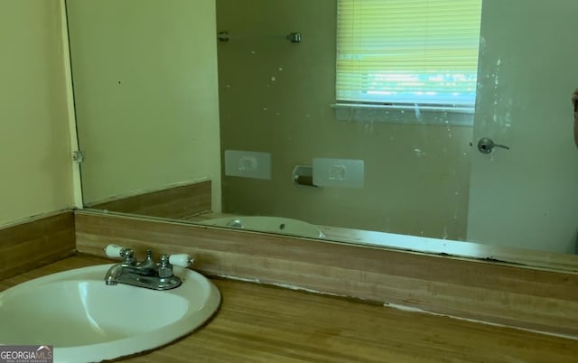 6521 Menlo Way, Rex, GA 30273 - bathroom featuring a sink and wood finished floors