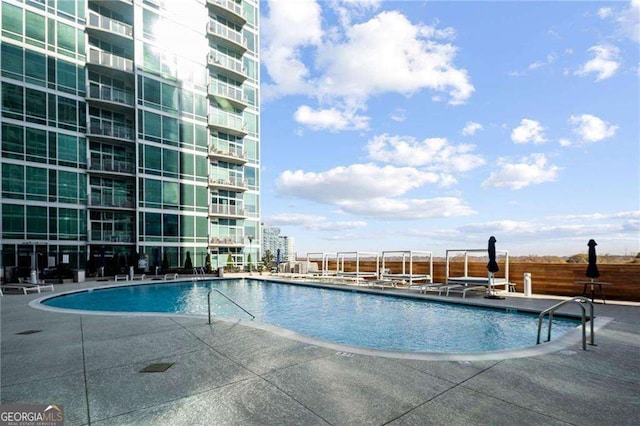 943 Peachtree St NE Unit 902, Atlanta, GA 30309 - community pool featuring a patio