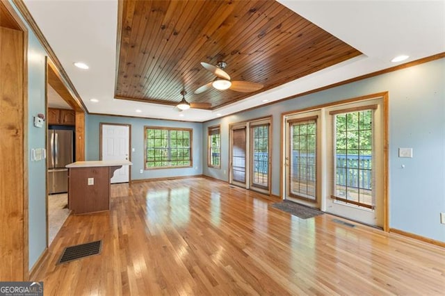 137 Trickum Hills Dr, Woodstock, GA 30188 - unfurnished living room with a tray ceiling, wood ceiling, ceiling fan, light wood-style floors, and recessed lighting
