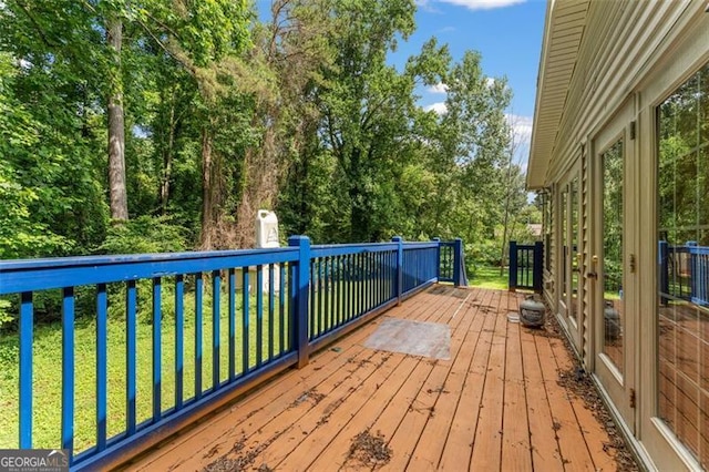 137 Trickum Hills Dr, Woodstock, GA 30188 - deck featuring a lawn