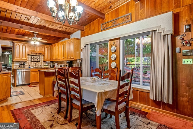 1813 Freeman Rd, Jonesboro, GA 30236 - dining space with a wooden ceiling with exposed beams, wooden walls, light wood-style floors, a chandelier, and a ceiling fan