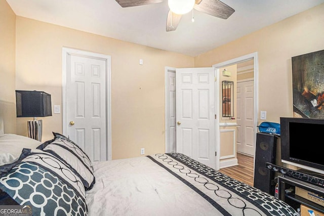 2437 Charleston Pointe Ct SE, Atlanta, GA 30316 - bedroom with wood finished floors and a ceiling fan