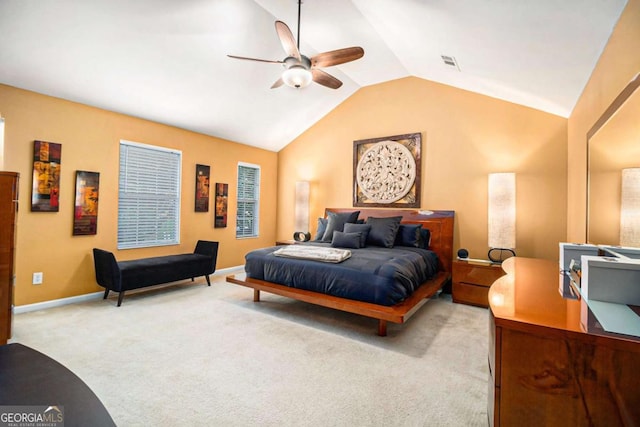 2437 Charleston Pointe Ct SE, Atlanta, GA 30316 - bedroom featuring light carpet, lofted ceiling, and a ceiling fan
