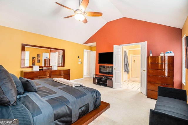 2437 Charleston Pointe Ct SE, Atlanta, GA 30316 - bedroom with light carpet, vaulted ceiling, and ceiling fan