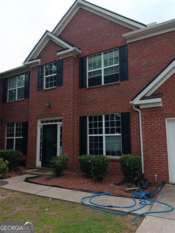 750 Ambrose Ln, Atlanta, GA 30349 - view of front facade featuring brick siding