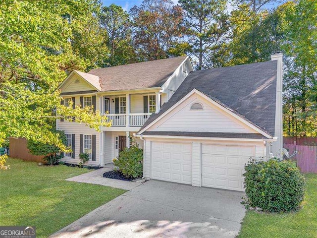 5223 Hollyfield Dr, Stone Mountain, GA 30088 - view of front of property featuring an attached garage, driveway, a balcony, and a chimney