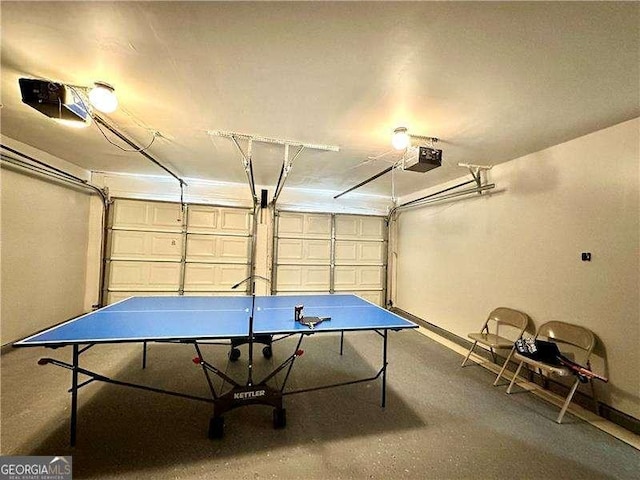 5223 Hollyfield Dr, Stone Mountain, GA 30088 - playroom featuring a garage and baseboards