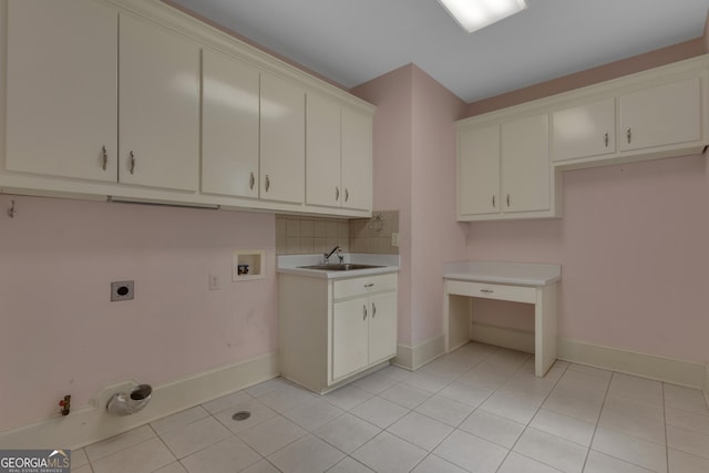 821 Carnellian Ln, Peachtree City, GA 30269 - washroom featuring hookup for a washing machine, gas dryer hookup, electric dryer hookup, light tile patterned floors, and cabinet space