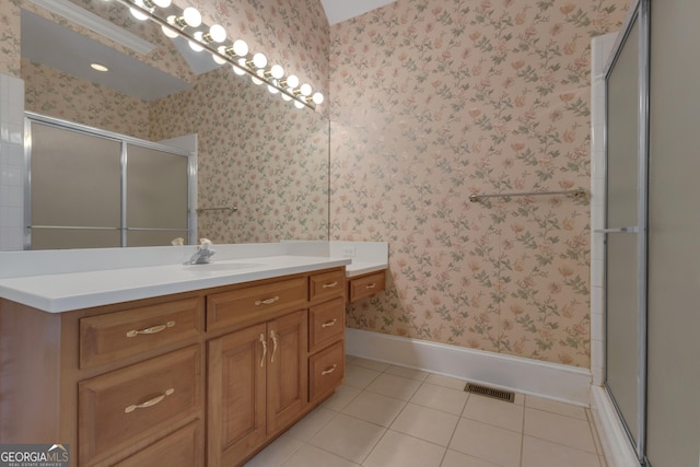 821 Carnellian Ln, Peachtree City, GA 30269 - full bathroom featuring wallpapered walls, a shower with door, vanity, and tile patterned flooring