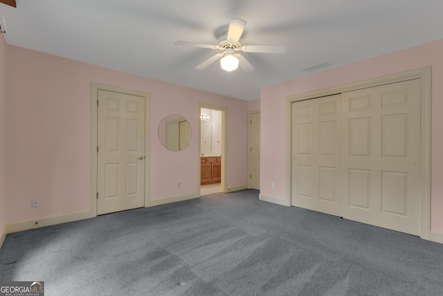821 Carnellian Ln, Peachtree City, GA 30269 - unfurnished bedroom with carpet floors, ensuite bath, and a ceiling fan