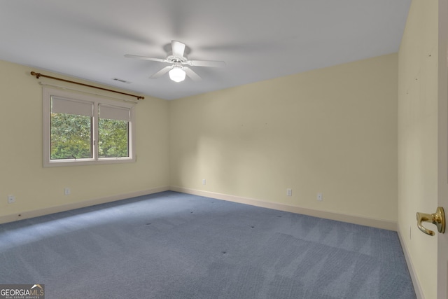 821 Carnellian Ln, Peachtree City, GA 30269 - carpeted empty room with a ceiling fan and baseboards