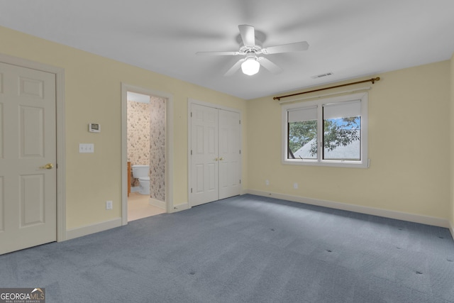821 Carnellian Ln, Peachtree City, GA 30269 - unfurnished bedroom featuring carpet, ensuite bathroom, and a ceiling fan