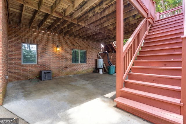 821 Carnellian Ln, Peachtree City, GA 30269 - view of patio / terrace featuring stairs and water heater
