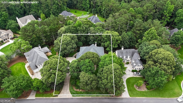 821 Carnellian Ln, Peachtree City, GA 30269 - aerial perspective of suburban area featuring property boundaries highlighted