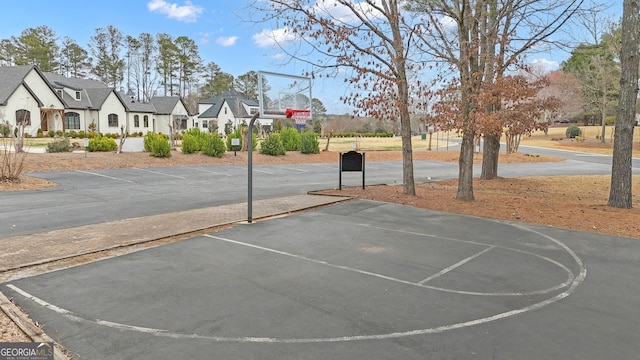 821 Carnellian Ln, Peachtree City, GA 30269 - view of sport court with community basketball court and a residential view