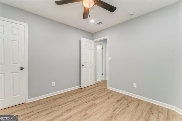 7074 Babbling Brook Dr, Jonesboro, GA 30236 - unfurnished bedroom featuring wood finished floors, ceiling fan, and recessed lighting