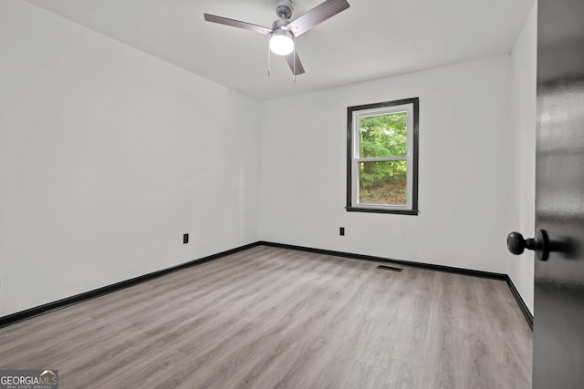 50 Hearthstone Dr, Newnan, GA 30263 - unfurnished room with wood finished floors and ceiling fan