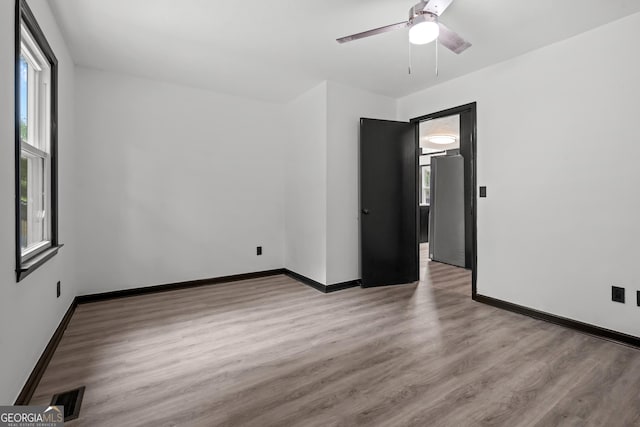 50 Hearthstone Dr, Newnan, GA 30263 - empty room featuring wood finished floors and a ceiling fan