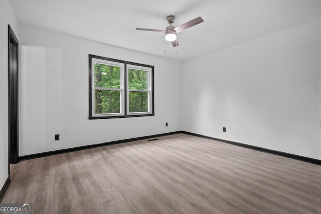 50 Hearthstone Dr, Newnan, GA 30263 - unfurnished room featuring wood finished floors and a ceiling fan