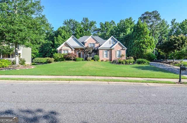 128 Laurel Ridge Dr, Alpharetta, GA 30004 - craftsman inspired home featuring a front lawn