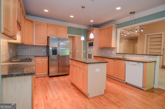 128 Laurel Ridge Dr, Alpharetta, GA 30004 - kitchen featuring appliances with stainless steel finishes, light brown cabinetry, a center island, light wood-style flooring, and ornamental molding
