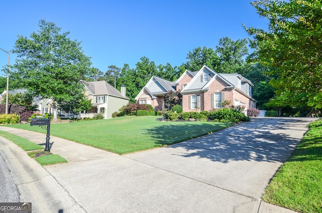 128 Laurel Ridge Dr, Alpharetta, GA 30004 - view of front of house featuring brick siding and a front lawn