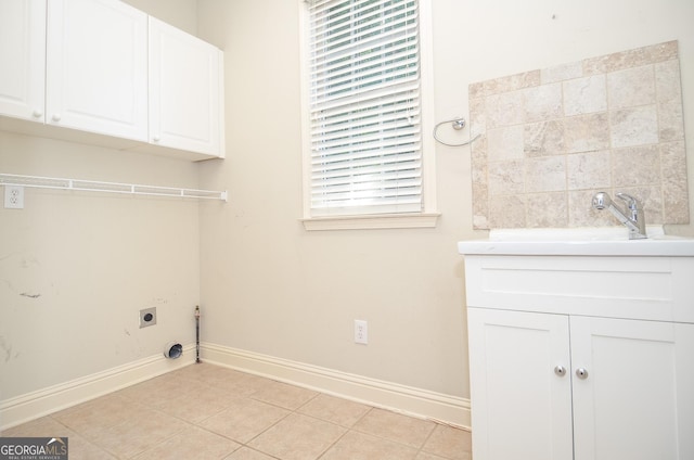 128 Laurel Ridge Dr, Alpharetta, GA 30004 - washroom featuring hookup for an electric dryer, cabinet space, and light tile patterned flooring