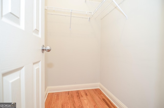 128 Laurel Ridge Dr, Alpharetta, GA 30004 - spacious closet with light wood-style floors