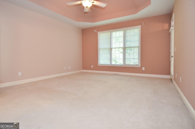 128 Laurel Ridge Dr, Alpharetta, GA 30004 - unfurnished room featuring ceiling fan, a tray ceiling, and light colored carpet