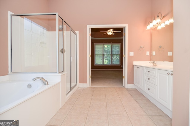 128 Laurel Ridge Dr, Alpharetta, GA 30004 - full bath with a garden tub, double vanity, tile patterned flooring, a shower stall, and a ceiling fan