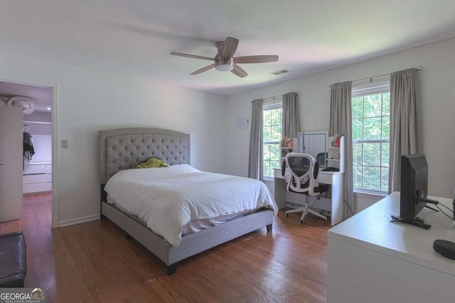 1908 Musket Ct, Stone Mountain, GA 30087 - bedroom featuring dark wood-style floors and ceiling fan