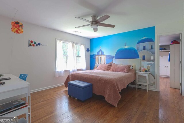 1908 Musket Ct, Stone Mountain, GA 30087 - bedroom with wood finished floors and ceiling fan