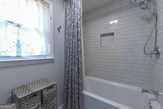 1908 Musket Ct, Stone Mountain, GA 30087 - bathroom featuring shower / bath combination with curtain