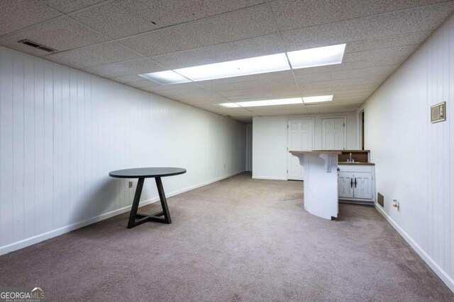 1908 Musket Ct, Stone Mountain, GA 30087 - basement with carpet flooring and a paneled ceiling