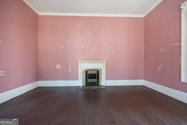67 Main St, Lumpkin, GA 31815 - unfurnished living room with wood-type flooring, crown molding, and a fireplace