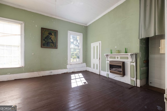 67 Main St, Lumpkin, GA 31815 - unfurnished living room featuring heating unit, ornamental molding, wood finished floors, and a fireplace
