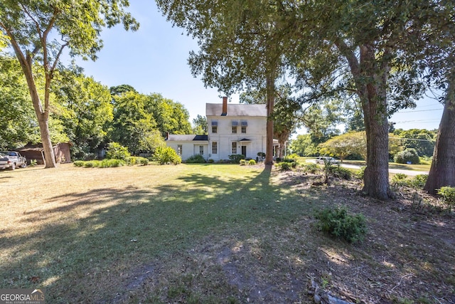 67 Main St, Lumpkin, GA 31815 - view of green lawn featuring a shed