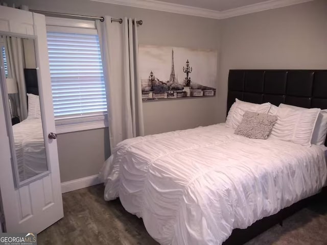 121 N Church St Unit 101, Clayton, GA 30525 - bedroom featuring ornamental molding, wood finished floors, and multiple windows