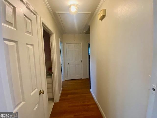 1812 Morgan Cantey Dr, Lanett, AL 36863 - hall with dark wood-type flooring and attic access