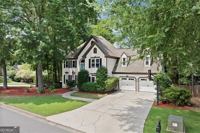 4300 May Apple Dr, Alpharetta, GA 30005 - view of front of property with concrete driveway, an attached garage, and stucco siding