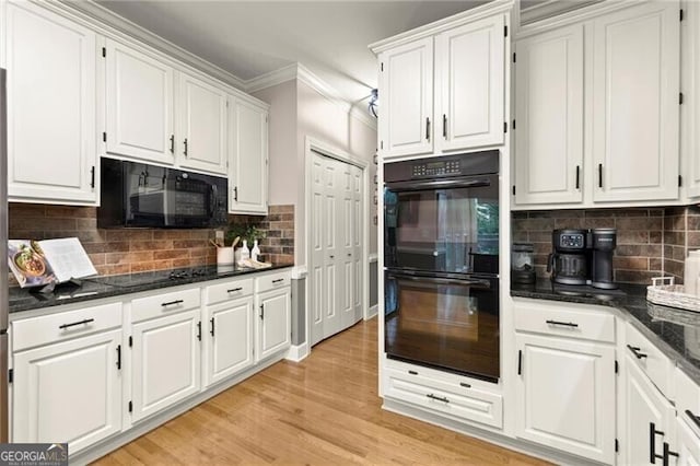 4300 May Apple Dr, Alpharetta, GA 30005 - kitchen with black appliances, ornamental molding, white cabinetry, and tasteful backsplash