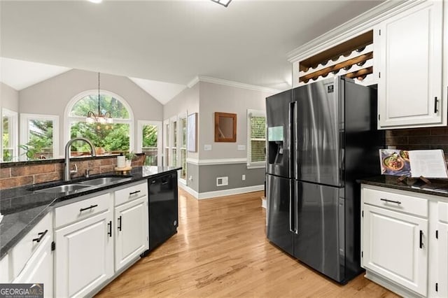 4300 May Apple Dr, Alpharetta, GA 30005 - kitchen featuring stainless steel fridge, dishwasher, white cabinets, vaulted ceiling, and crown molding