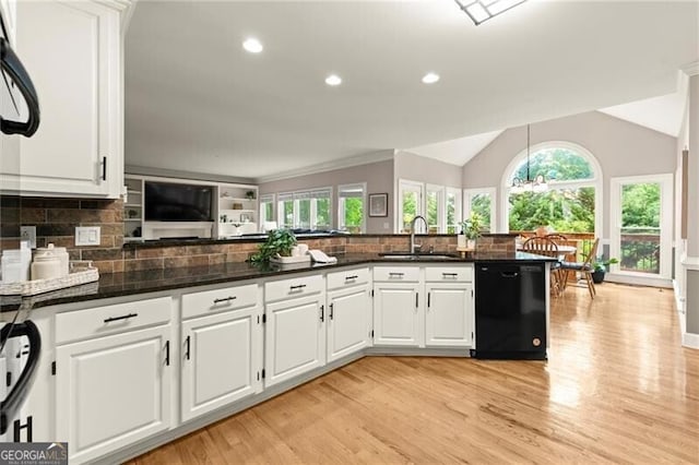 4300 May Apple Dr, Alpharetta, GA 30005 - kitchen featuring black dishwasher, light wood-type flooring, decorative backsplash, plenty of natural light, and recessed lighting