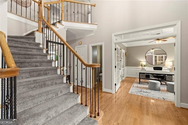4300 May Apple Dr, Alpharetta, GA 30005 - stairway with wood finished floors, a high ceiling, french doors, and a ceiling fan